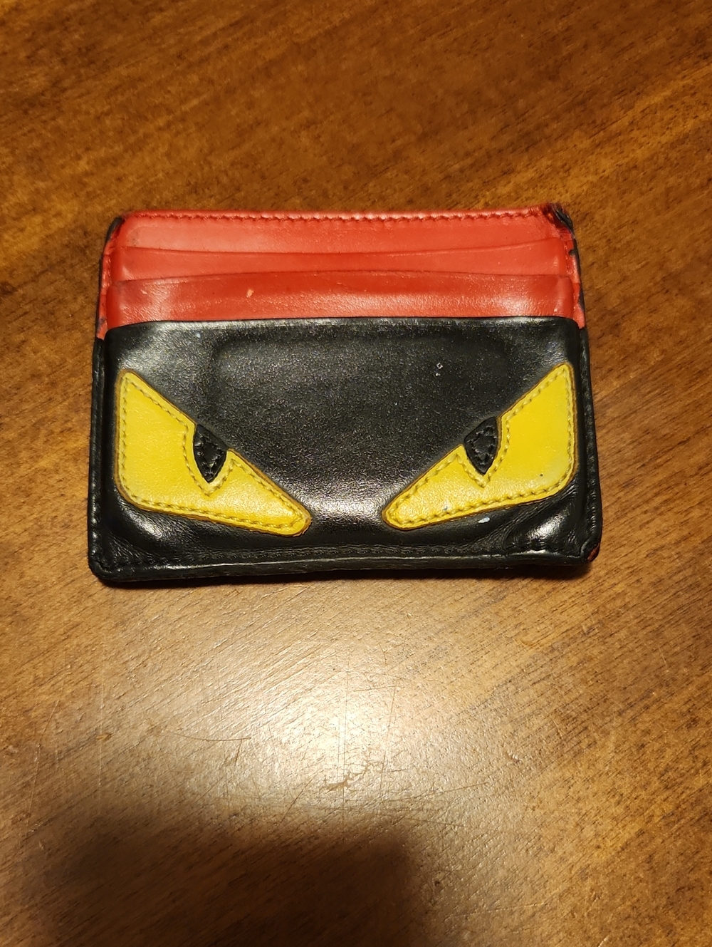 Fendi Black Card Holder with Red Slots and Yellow Eye Appliqués